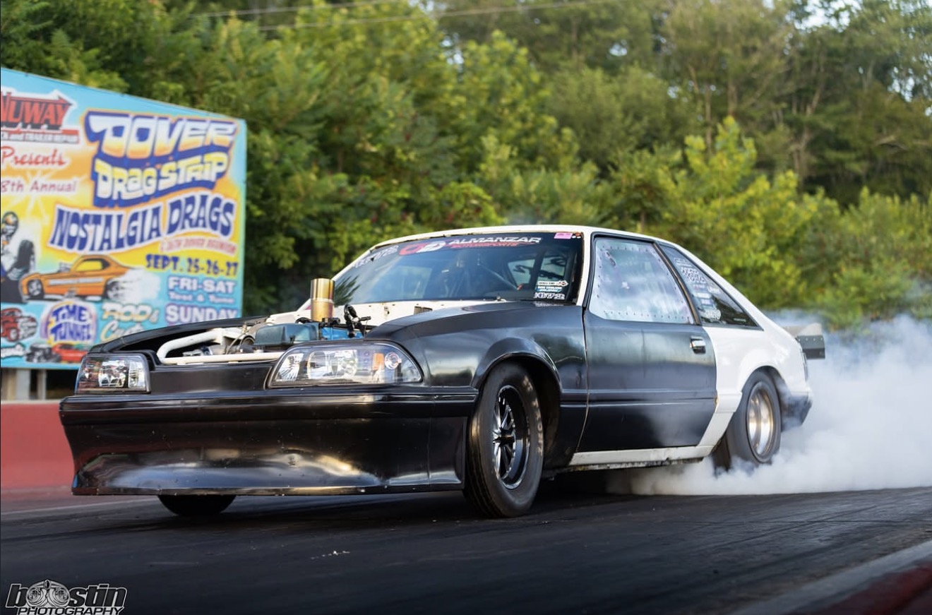 Fox body Mustang performing a burnout at Wild in the Valley